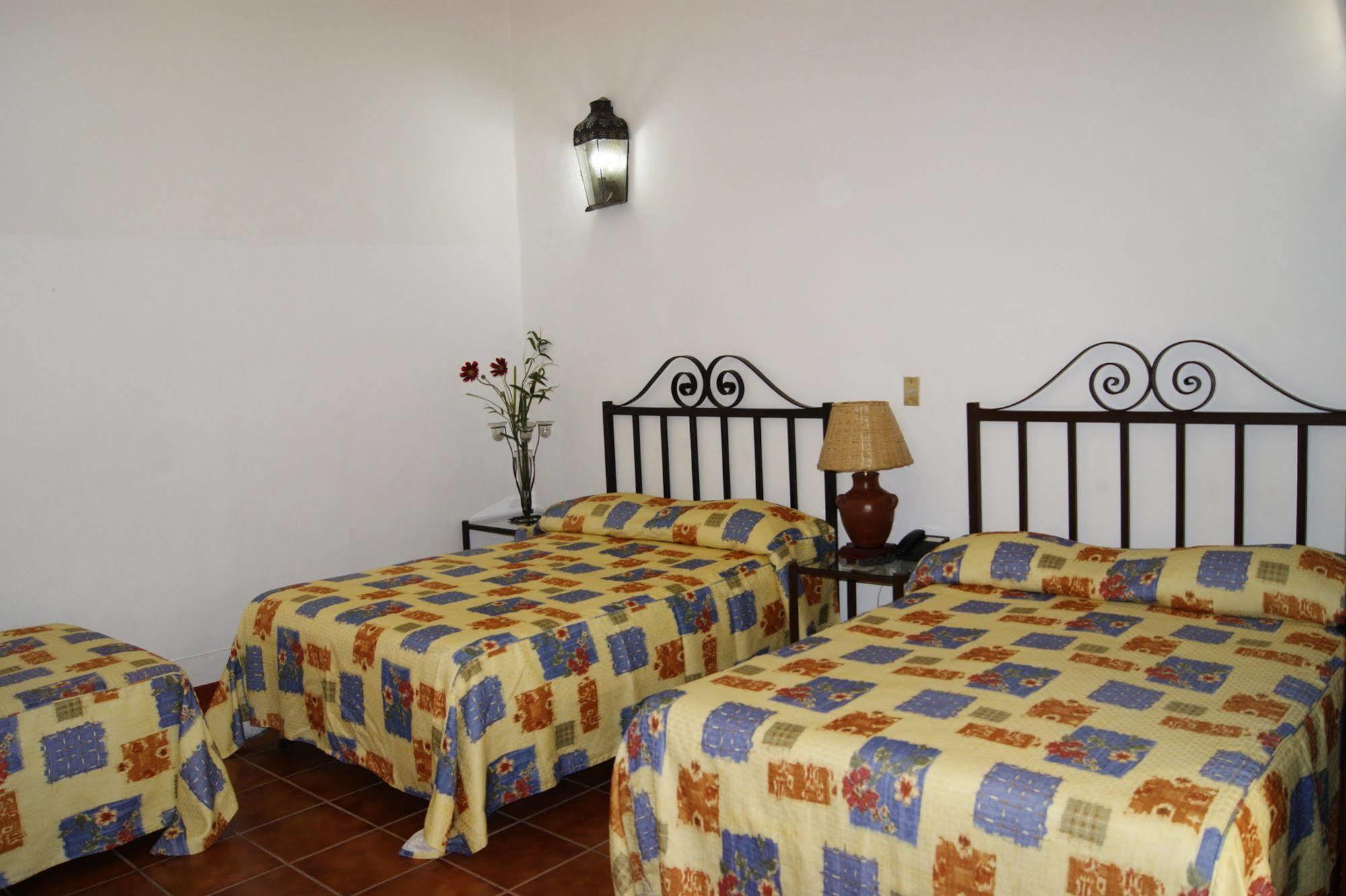 Capital O El Nito Posada Oaxaca Экстерьер фото
